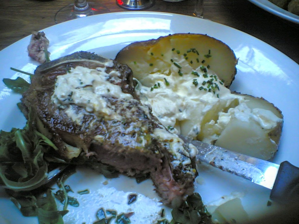 Porterhouse on the bone and roast spud with sour cream n chives