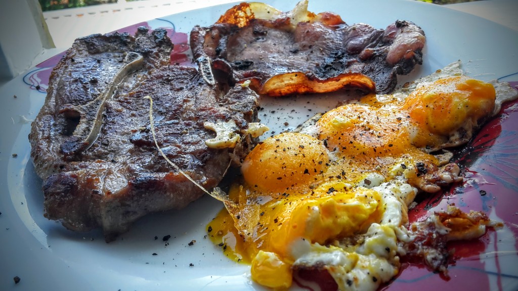 Lamb chop, bacon, and egg yolks