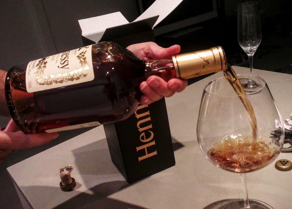 Pouring Hennesey cognac